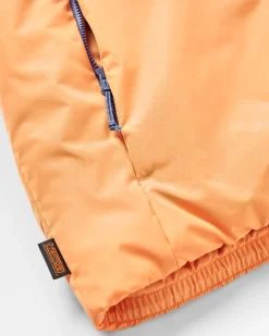 Singletrack Recycelte Thermore®-Isolierjacke - Dunkelblau/Aprikose