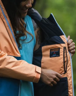 Terrain isolierte wasserabweisende Jacke - Korsarblau/Aprikose