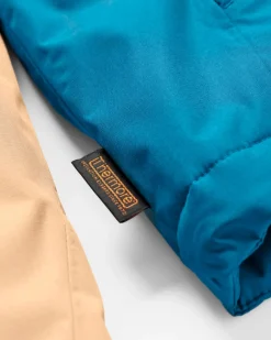 Terrain isolierte wasserabweisende Jacke - Korsarblau/Aprikose